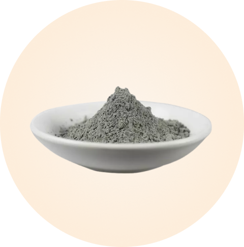 gray powder in a bowl, representing zinc and copper